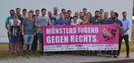 Stefan Körzell und DGB Jugend mit Transparent "Münsters Jugend gegen Rechts"